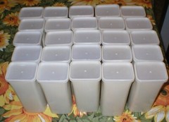 25 EMPTY PLASTIC CONTAINERS WITH LIDS 6-1/4″ X 2-1/2″ SOLD AS IS