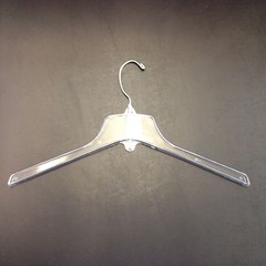 CLEAR PLASTIC JACKET/COAT, HANGER 16.5 in WIDE HEAVIER WEIGHT,70/CASE USED