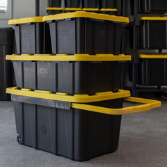 27 Gal. Tough Storage Tote with Wheels and Handle in Black and Yellow NEW