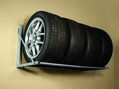 Effortless Garage Organization: 32-48 Inch Folding Tire Storage Rack in Silver