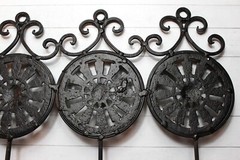 Vintage Cast Iron Metal Black Medallion Wall Hooks Four on One Piece Cottage